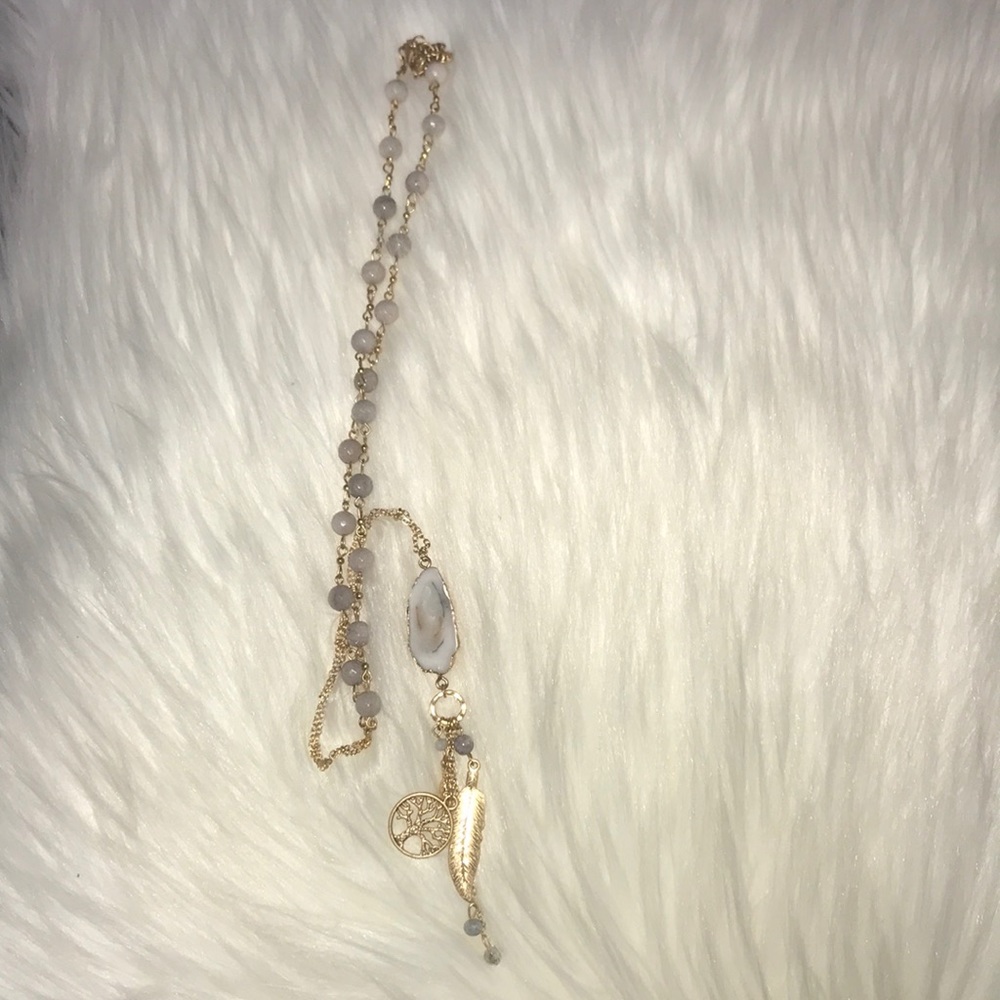 Long gold necklace